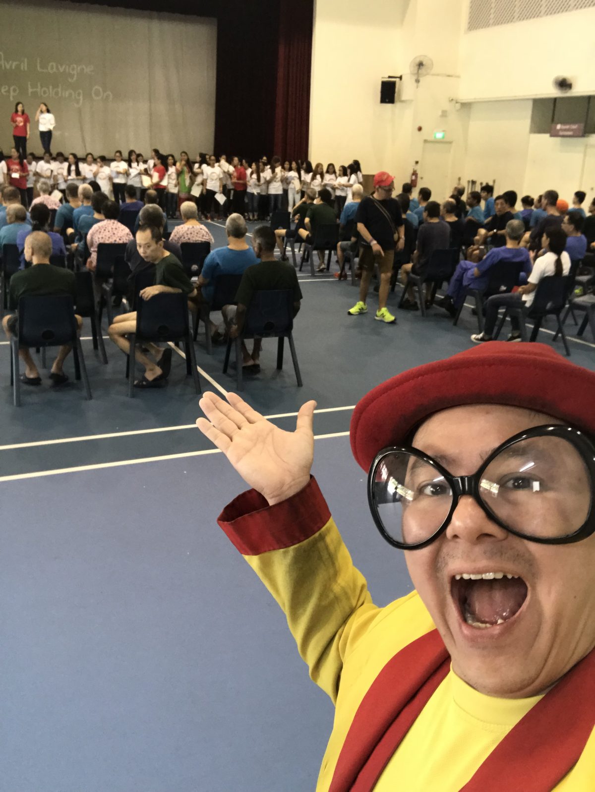 Maddie performing to a full hall